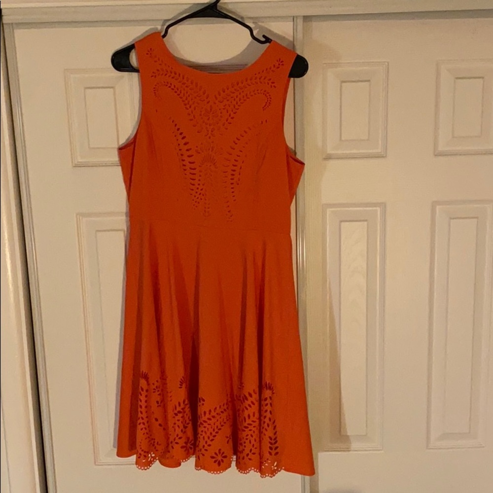 Coral dress with cutouts